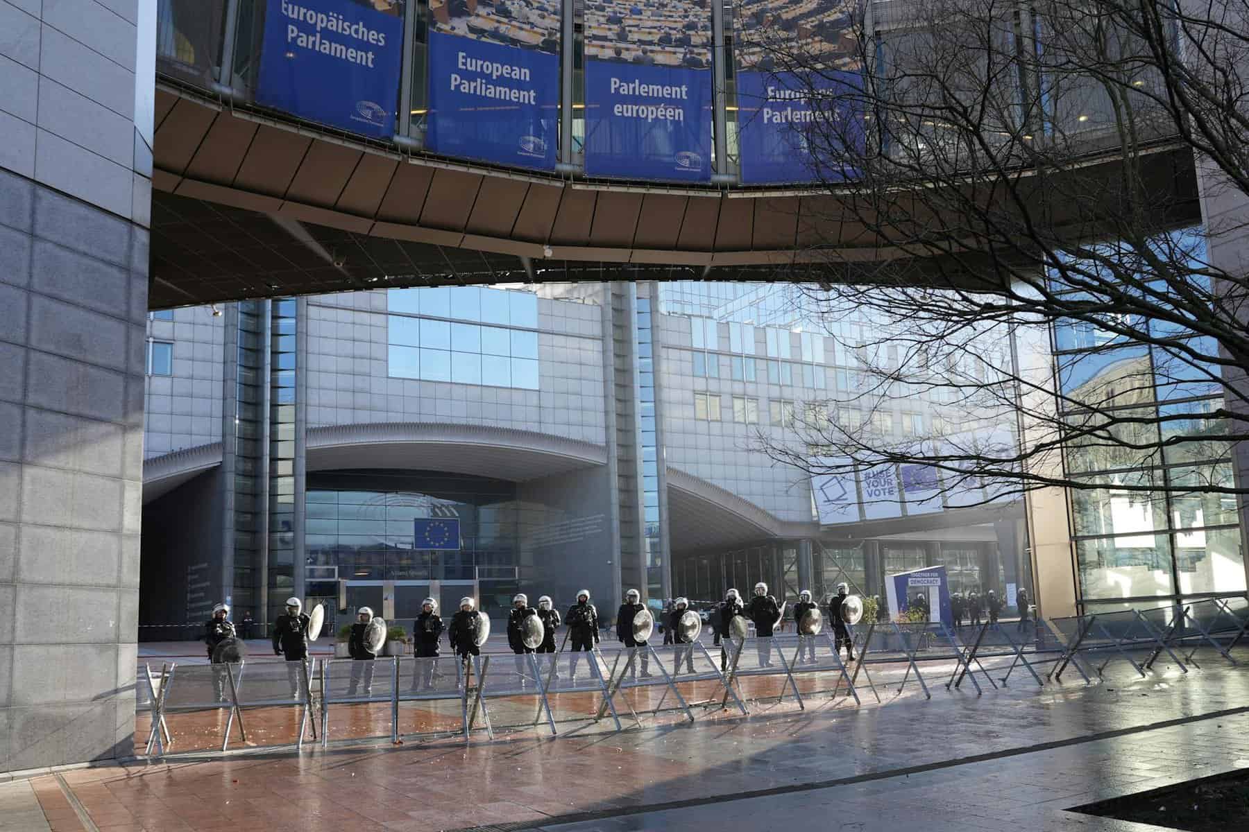 police defending european parliament on protest